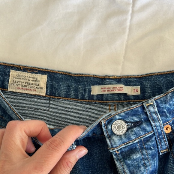 Levi's Premium Ribcage Straight Size 28 Medium Wash. Color is Georgie - Picture 9 of 15